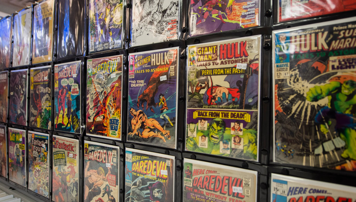 A wall filled with comic books at 412 Comics